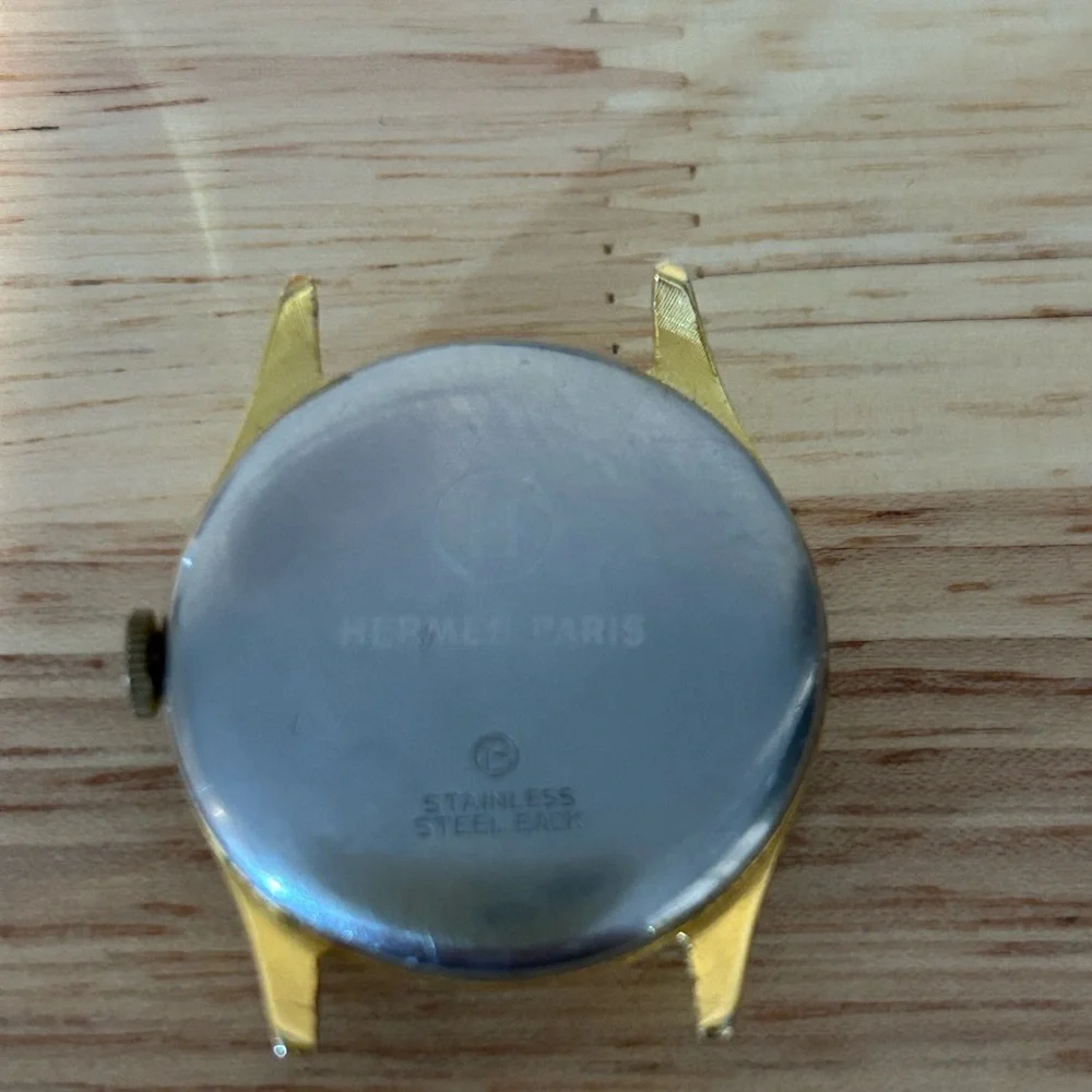 HERMES Paris “Moon Lugs” manual wind 33-34mm X 39mm, 17mm strap width.